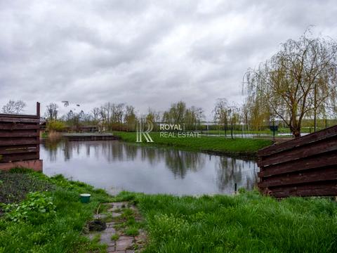 будинок за адресою с. Нові Безрадичі, Садова, 1
