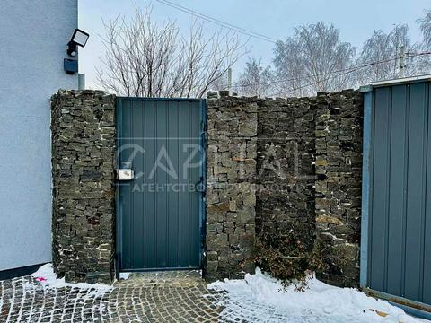 будинок за адресою с. Гатне, Жулянська вул., 10