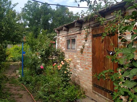 дом по адресу Комарова 1