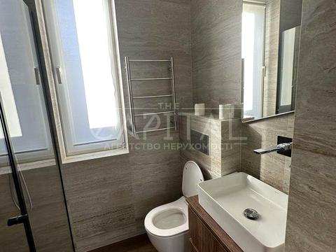 будинок за адресою с. Петропавлівська Борщагівка, Київська вул., 12