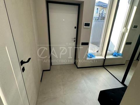 будинок за адресою с. Петропавлівська Борщагівка, Київська вул., 12