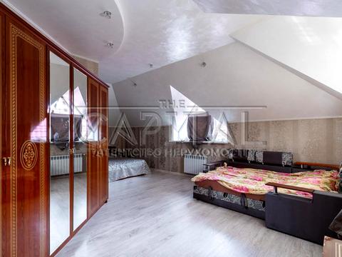 будинок за адресою вул. Травнева