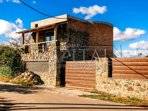 дом по адресу Бучанський