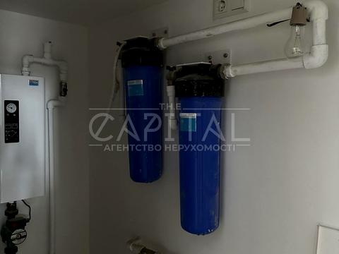 будинок за адресою Євгена Коновальця вул., 49