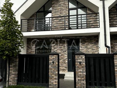 будинок за адресою Євгена Коновальця вул., 49