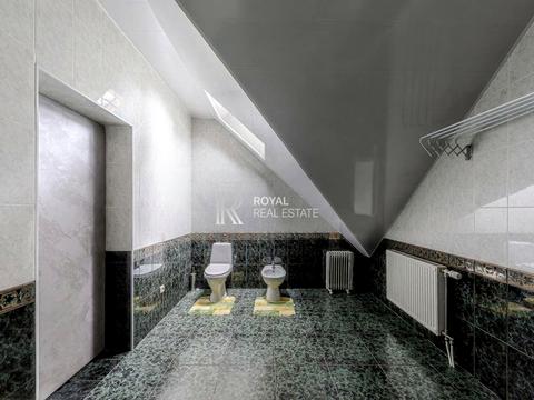 будинок за адресою смт. Козин, Київська вул., 55