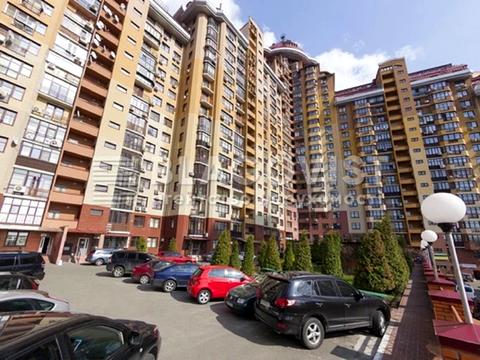 паркомісце за адресою Євгена Коновальця вул. (Щорса), 32-Б