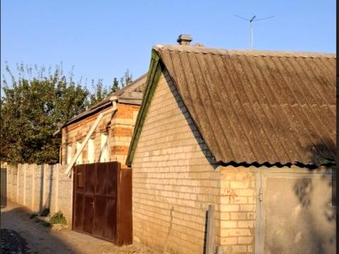 дом по адресу пгт. Ольшаны, Парковська вул., 46