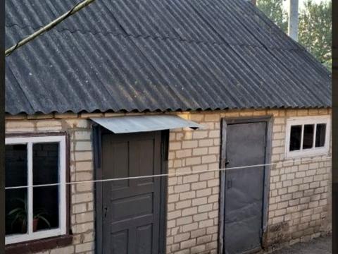 дом по адресу пгт. Ольшаны, Парковська вул., 46