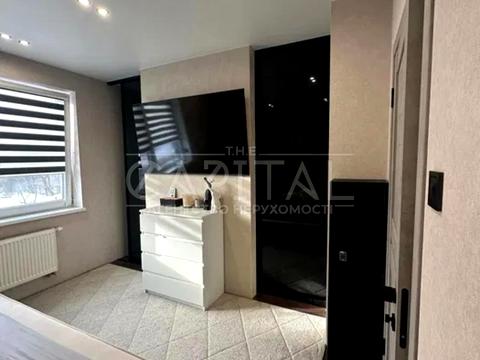 будинок за адресою Леоніда Каденюка вул. (Поповича), 1-Б