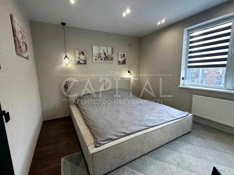 будинок за адресою Леоніда Каденюка вул. (Поповича), 1-Б