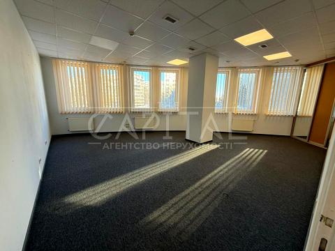 комерційна за адресою Євгена Коновальця вул. (Щорса), 36-Б