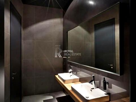 комерційна за адресою Євгена Коновальця вул. (Щорса), 32-Б