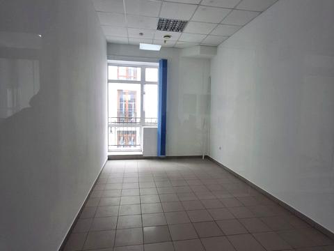 комерційна за адресою Ринок вул., 1