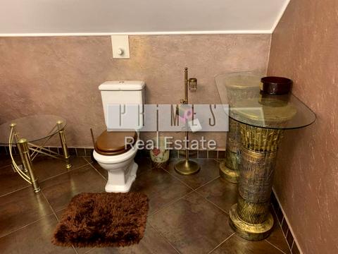 будинок за адресою смт. Козин, Київська вул., 55