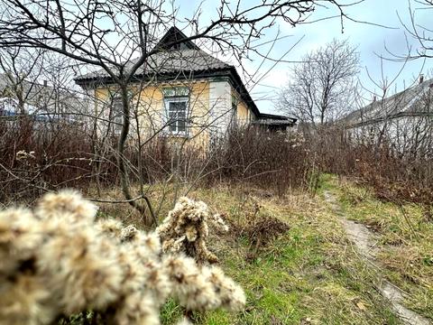 будинок за адресою вул. Поштова (Жовтнева), 84-а