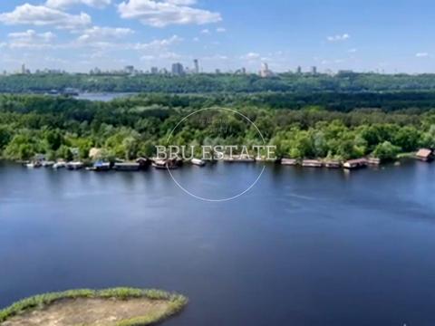 комерційна за адресою Микільсько-Слобідська вул., 11