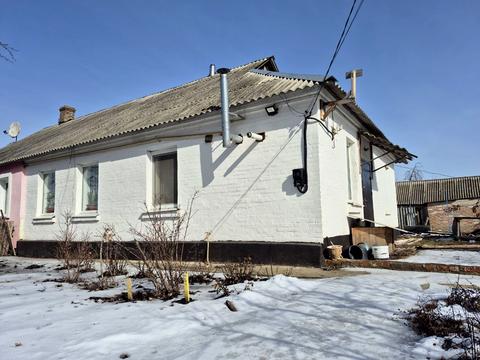 дом по адресу Комарова 1