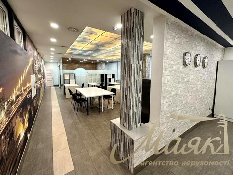 комерційна за адресою Євгена Коновальця вул. (Щорса), 32-Б