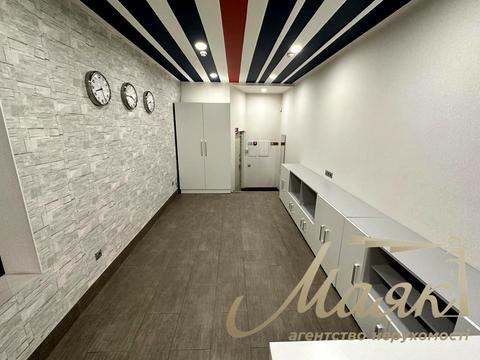 комерційна за адресою Євгена Коновальця вул. (Щорса), 32-Б