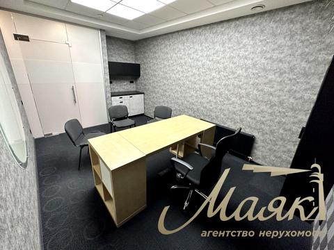 комерційна за адресою Євгена Коновальця вул. (Щорса), 32-Б