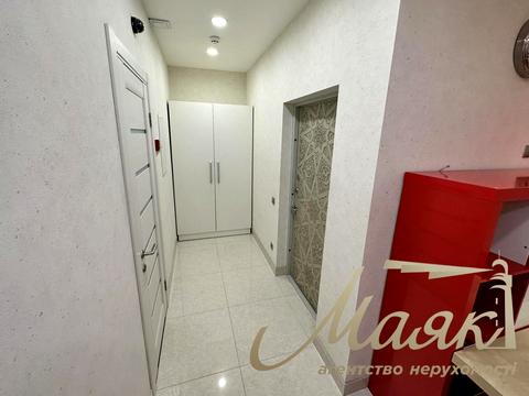 комерційна за адресою Євгена Коновальця вул. (Щорса), 32-Б