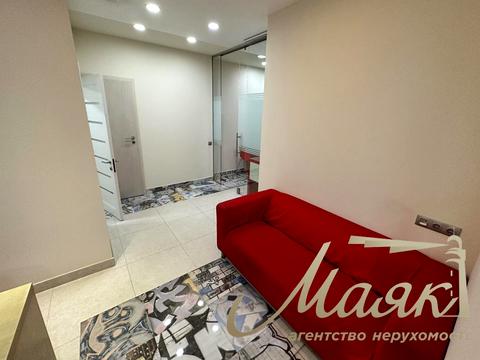 комерційна за адресою Євгена Коновальця вул. (Щорса), 32-Б