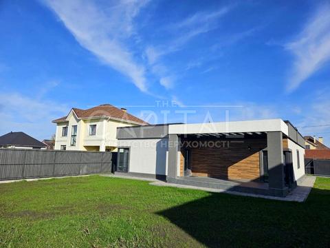 будинок за адресою вул. Орхідейна