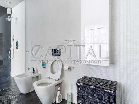 будинок за адресою смт. Козин, Лугова вул., 34