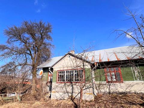 будинок за адресою с. Дев'ятники, Лісова