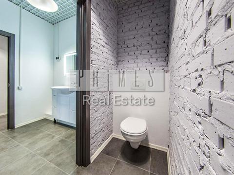 комерційна за адресою Євгена Коновальця вул. (Щорса), 34-А