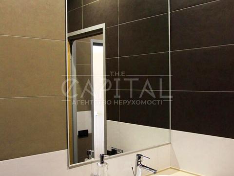 комерційна за адресою Євгена Коновальця вул. (Щорса), 44-А