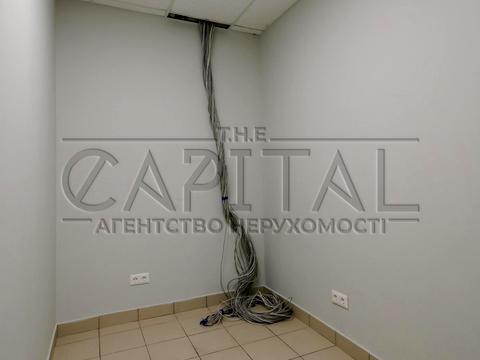 комерційна за адресою Шовковична вул., 38