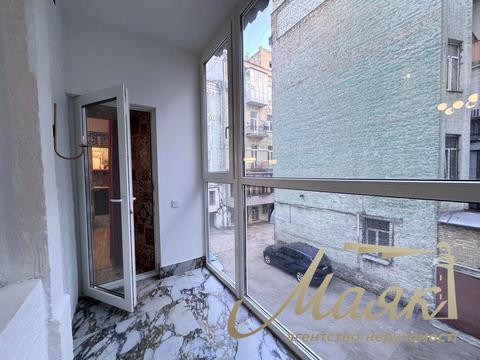 комерційна за адресою Володимирська вул., 92