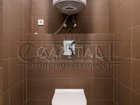 комерційна за адресою Миколи Міхновського бульв. (Дружби народів), 1