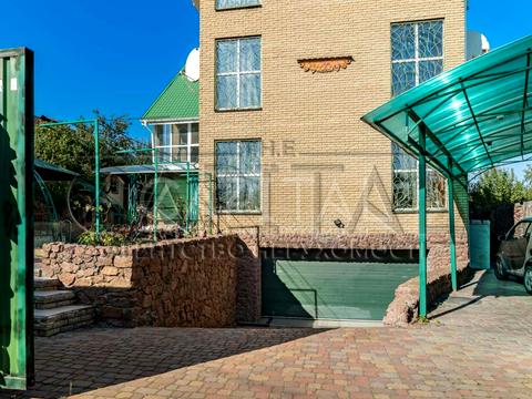 будинок за адресою Огіркова вул.