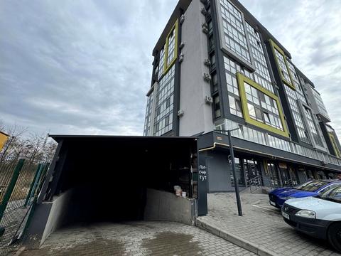 паркомісце за адресою Садова вул., 2e