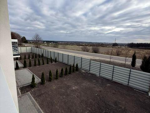 будинок за адресою Коновальця