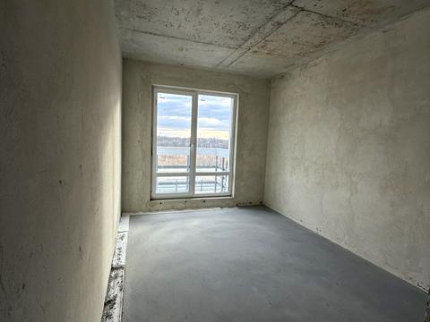 будинок за адресою Коновальця