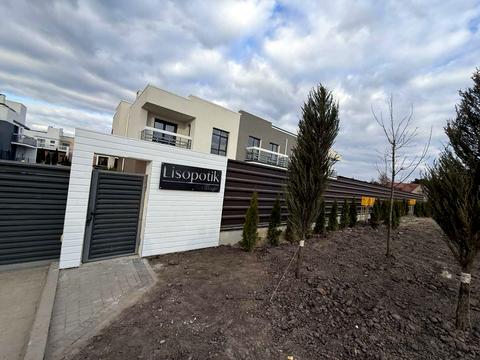 будинок за адресою Коновальця