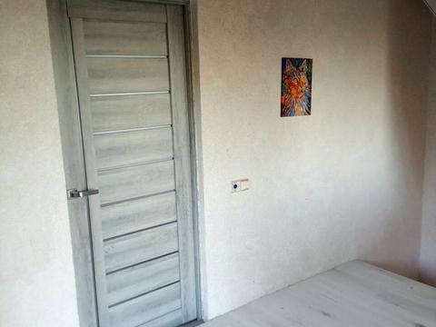 дом по адресу Коновальця