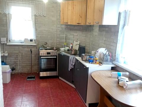 дом по адресу Коновальця