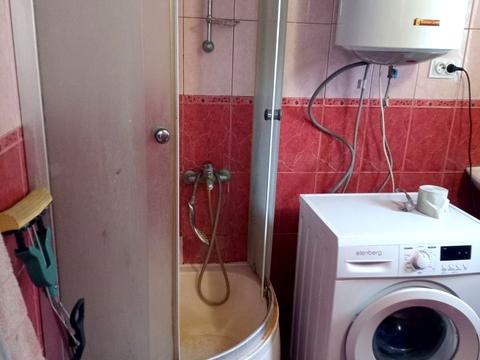 дом по адресу Коновальця