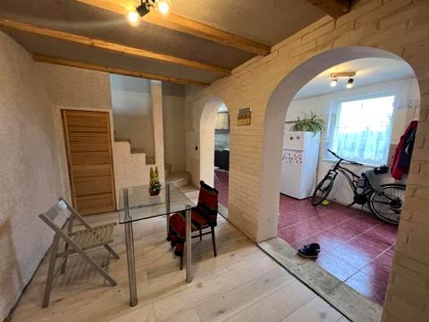 дом по адресу Коновальця