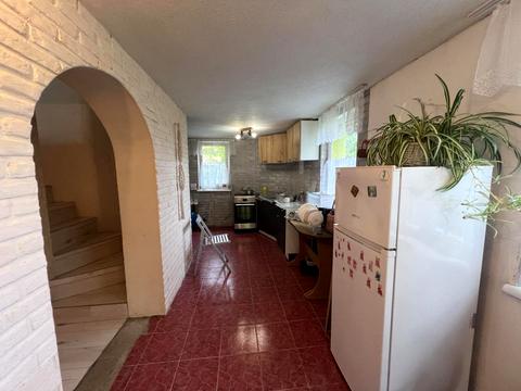 дом по адресу Коновальця