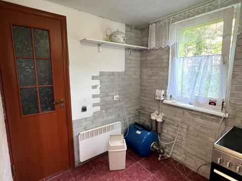 дом по адресу Коновальця