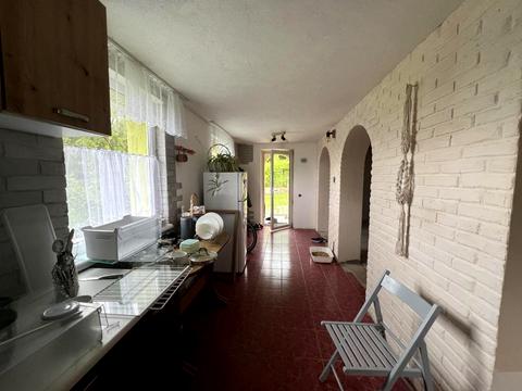 дом по адресу Коновальця