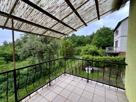 дом по адресу Коновальця