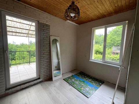 дом по адресу Коновальця