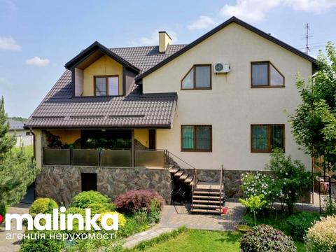 будинок за адресою Романа Шухевича вул.